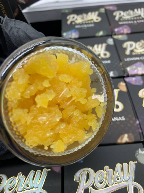 A jar of Persy Diamonds, showcasing the clear, crystalline cannabis concentrate, ready to provide a potent experience.